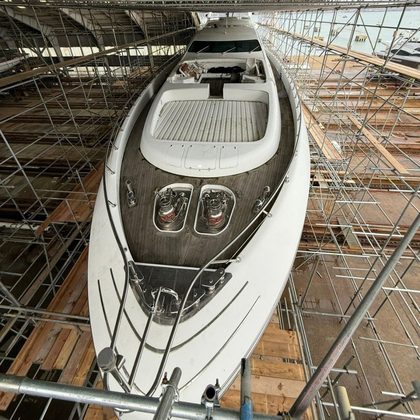 Yacht inside a scaffold enclosure ready for containment during a refit